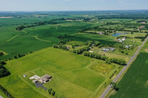 a view of a golf course with a big yard