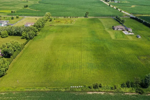 a view of a golf course with a lake