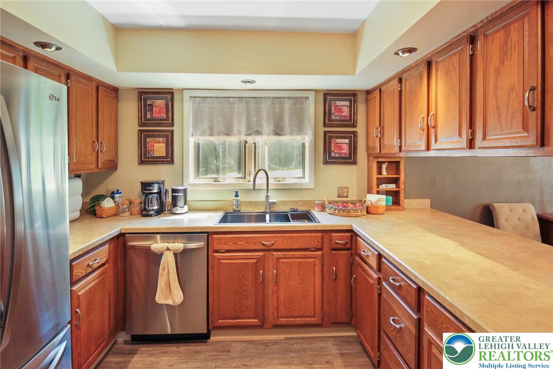 3470 Brodhead Road Bethlehem, PA 18020 - Photo 46 of 84 A well-equipped kitchen features ample cabinetry, practical counter space, and a dual basin sink.