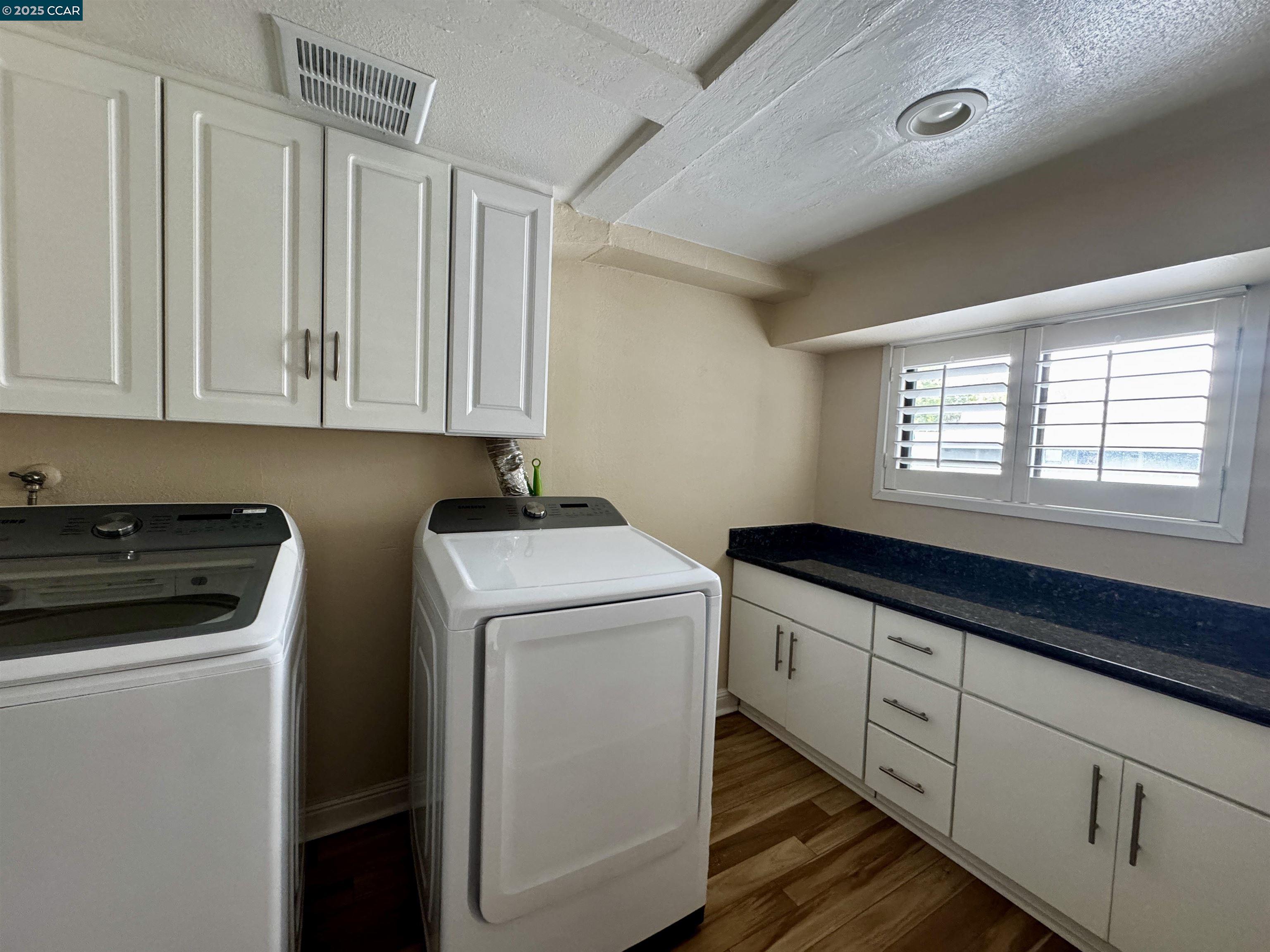 1640 San Miguel Drive Walnut Creek, CA 94596 - Photo 15 of 21 a utility room with dryer and washer