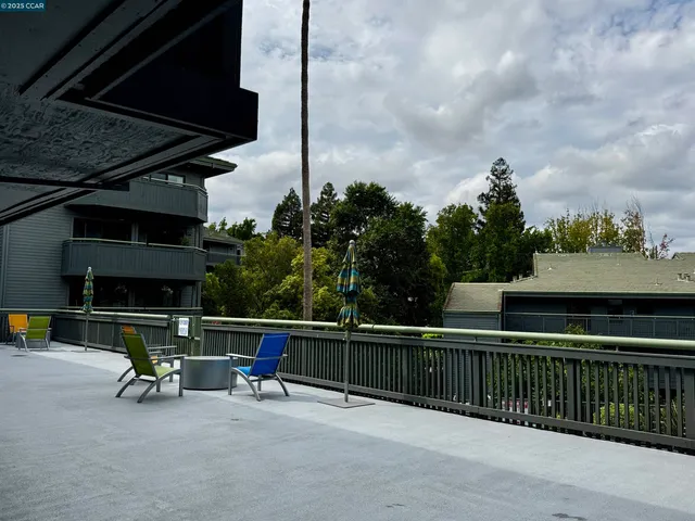 a view of outdoor space with wooden fence