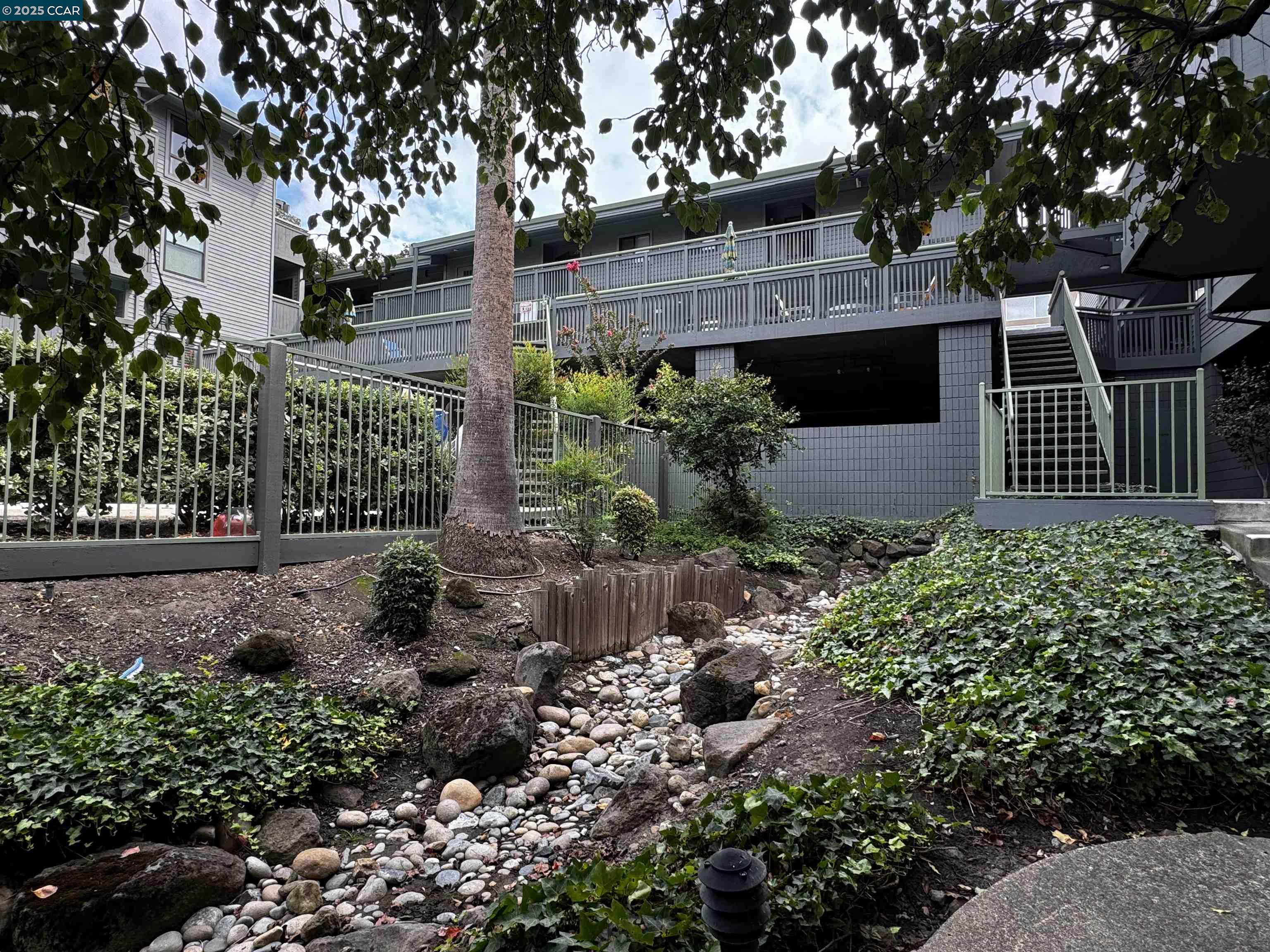 1640 San Miguel Drive Walnut Creek, CA 94596 - Photo 21 of 21 a view of a house with a garden