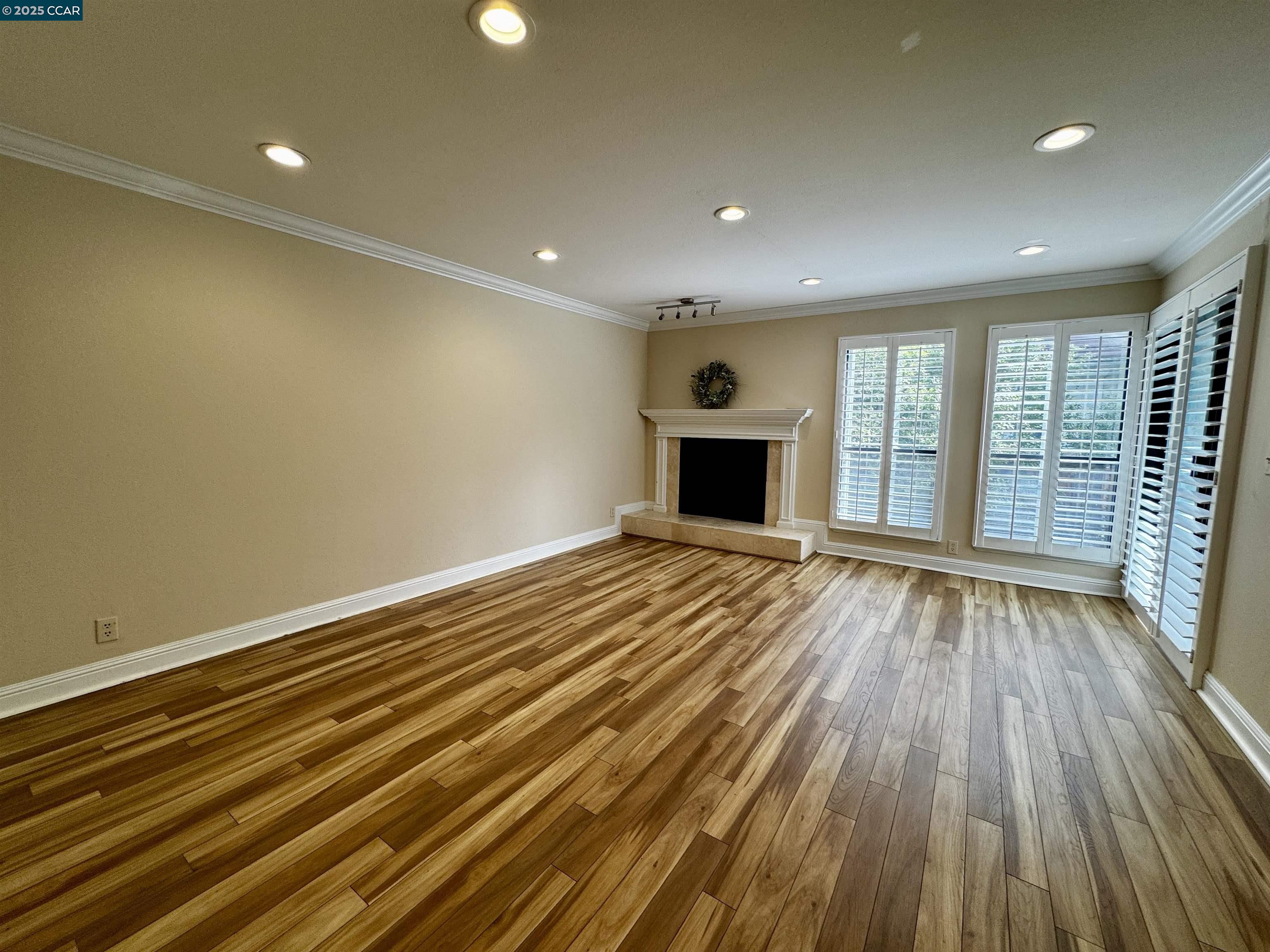 1640 San Miguel Drive Walnut Creek, CA 94596 - Photo 6 of 21 wooden floor in an empty room with a window