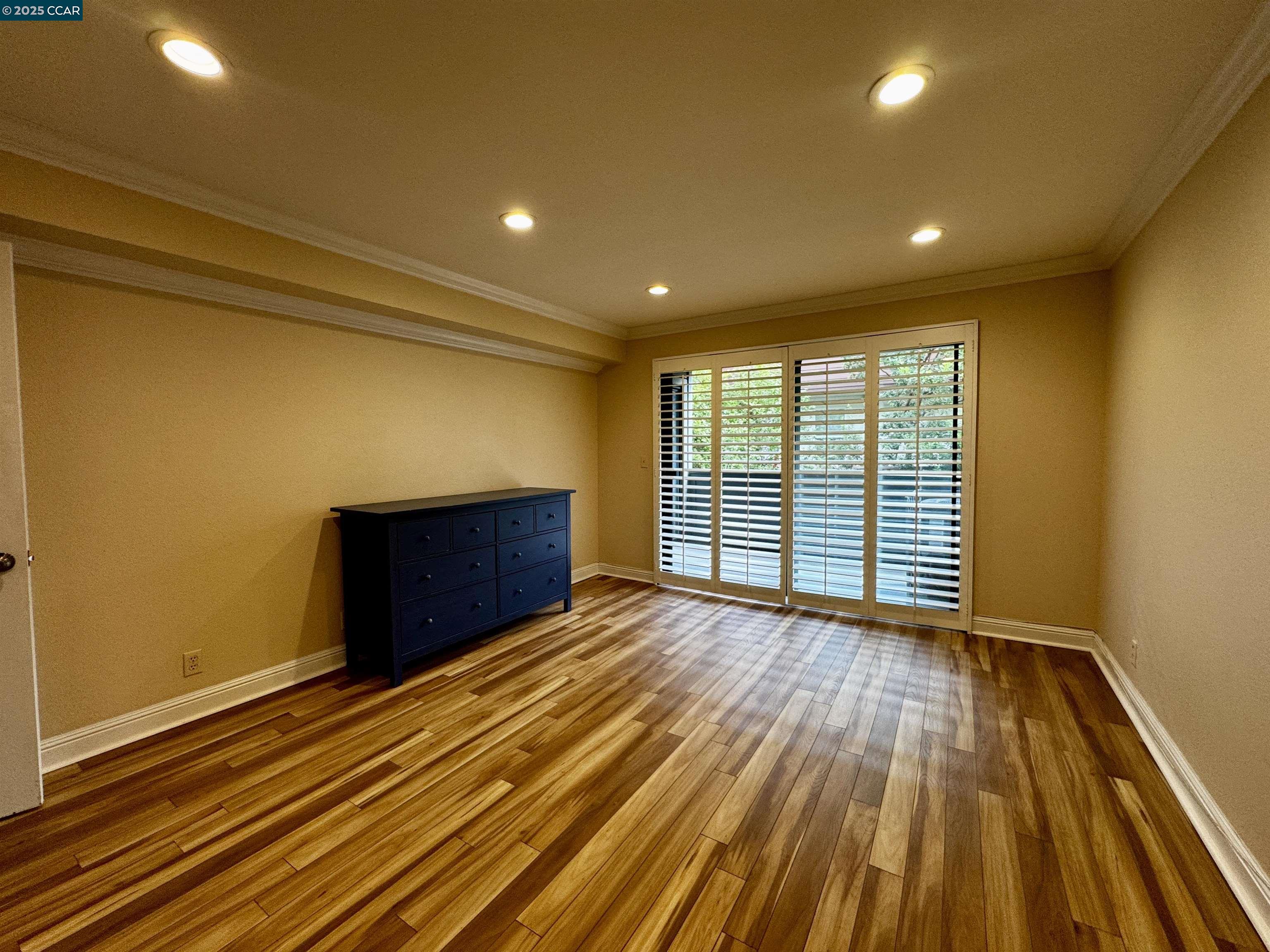 1640 San Miguel Drive Walnut Creek, CA 94596 - Photo 8 of 21 a view of empty room with wooden floor and fan