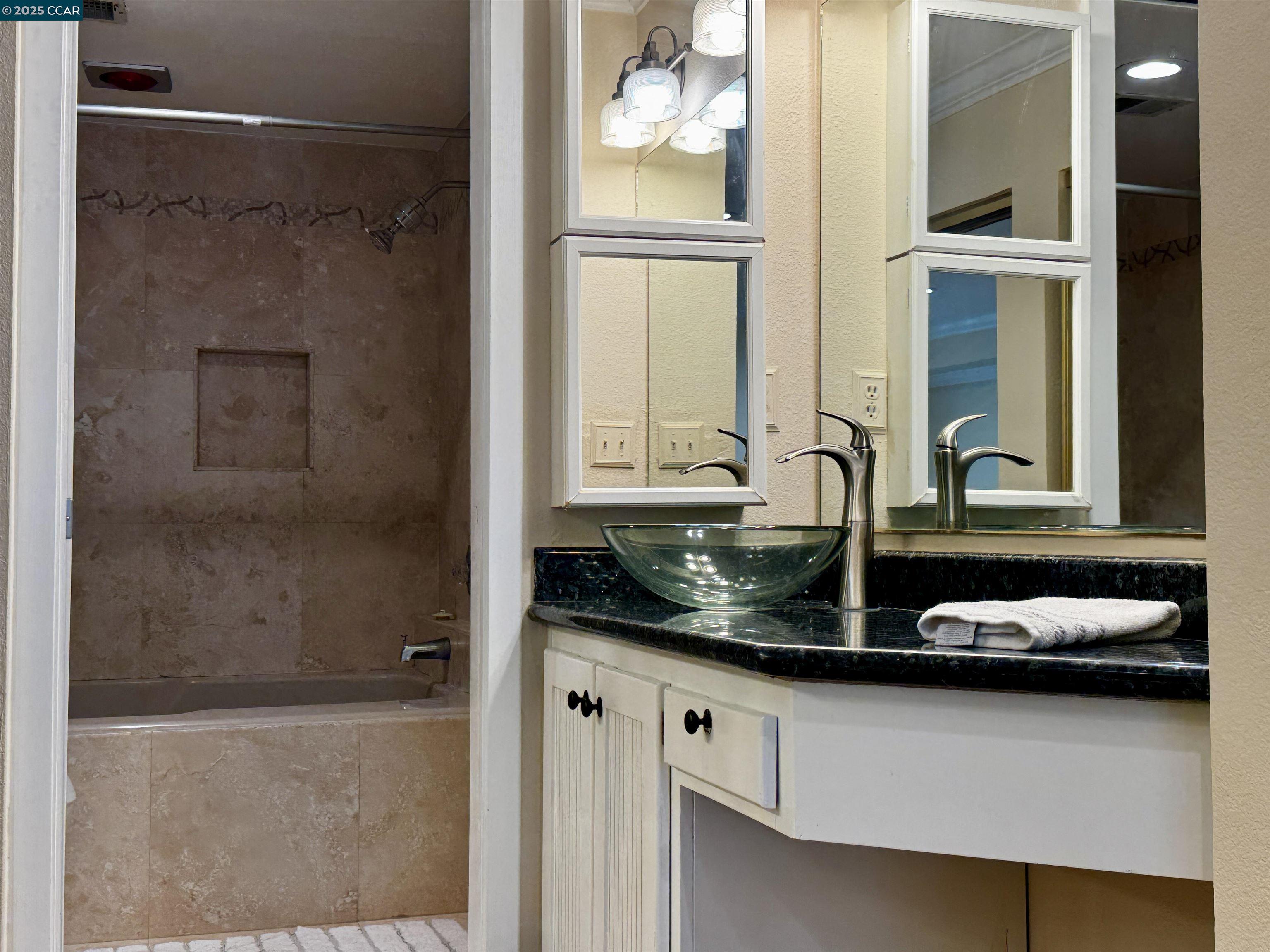 1640 San Miguel Drive Walnut Creek, CA 94596 - Photo 10 of 21 a bathroom with a granite countertop sink and a mirror
