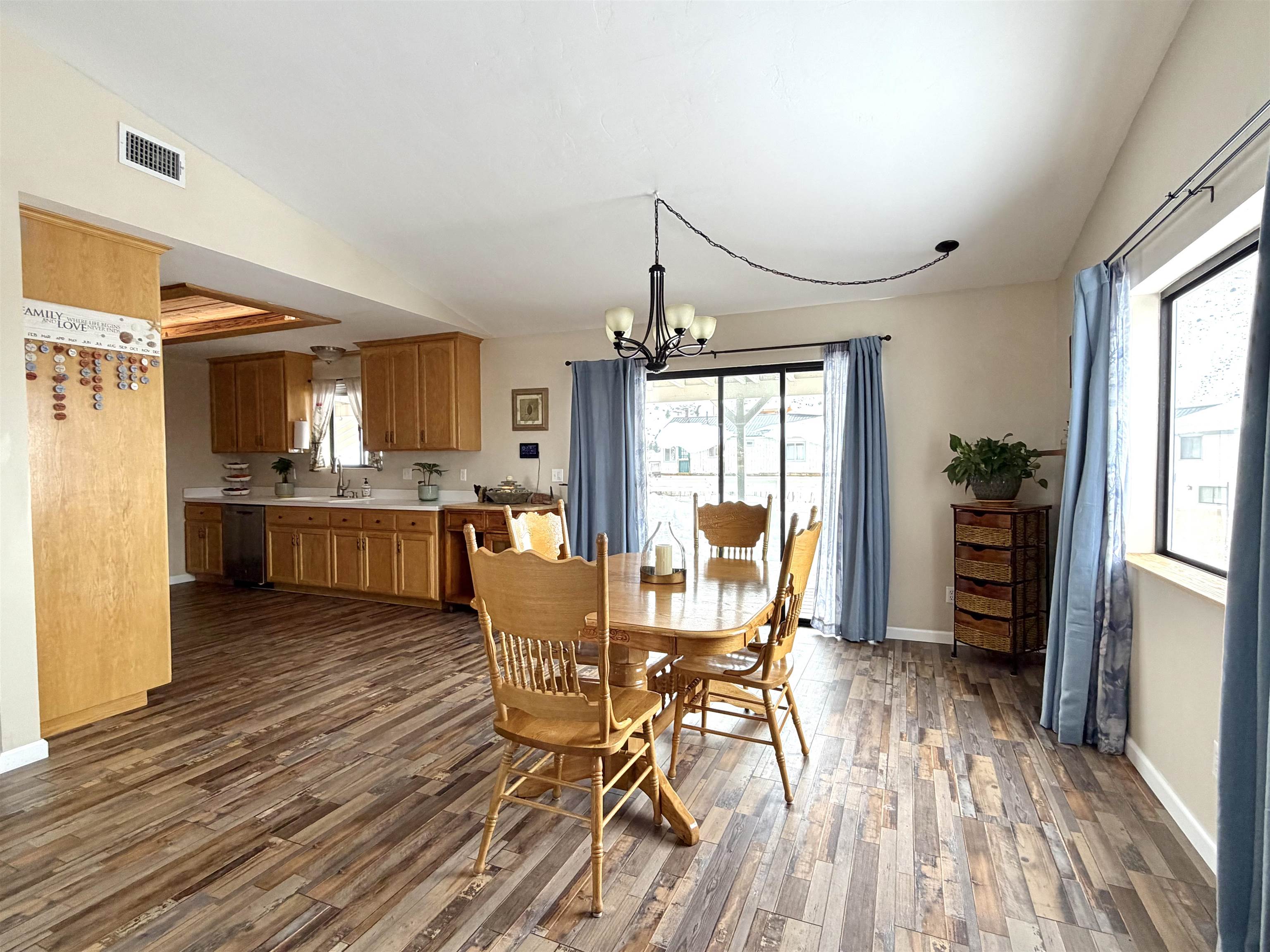 191 Alpine Drive Bishop, CA 93514 - Photo 21 of 50 a view of a dining room with furniture window and wooden floor