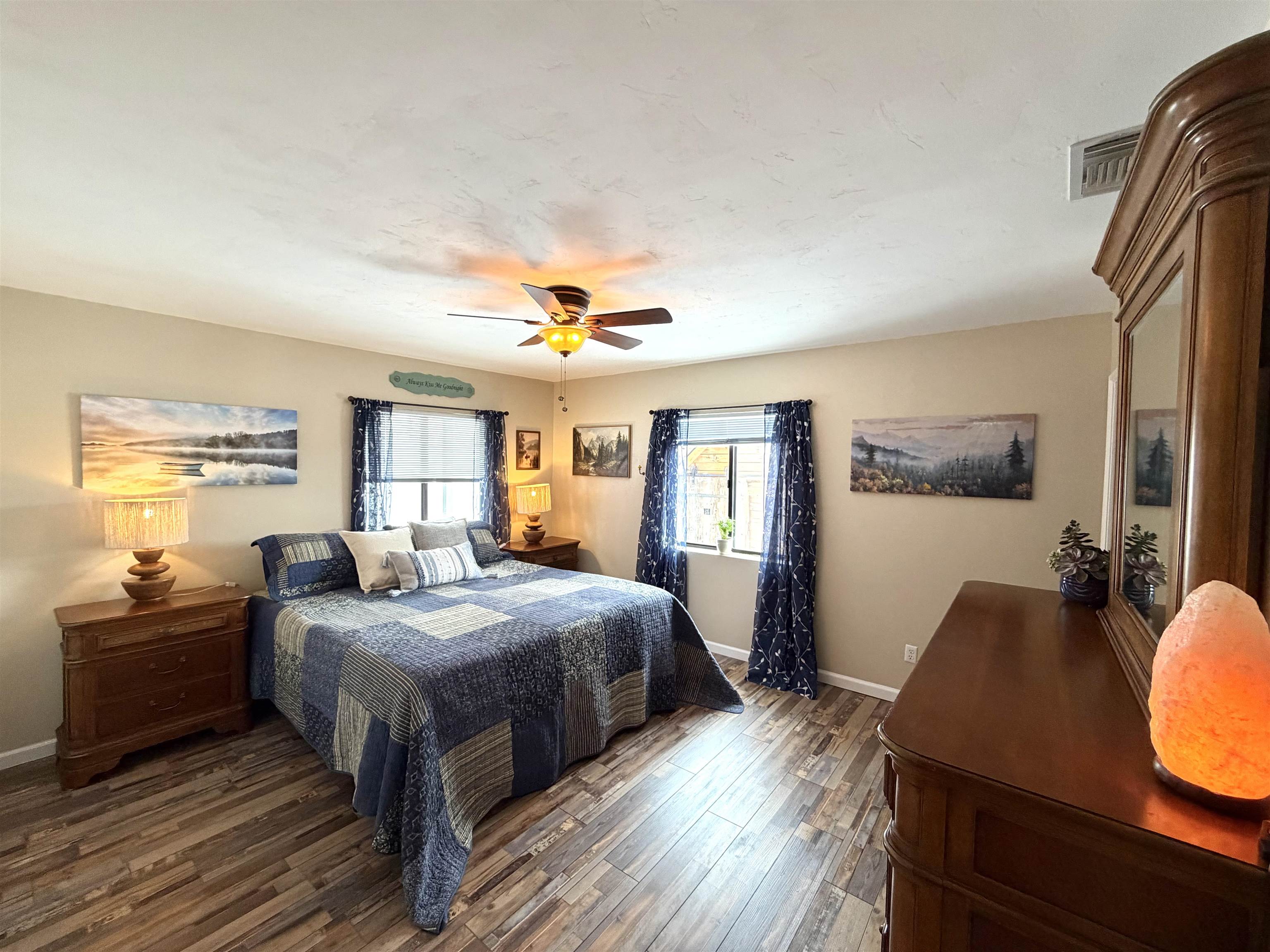 191 Alpine Drive Bishop, CA 93514 - Photo 36 of 50 a bedroom with a bed and wooden floor