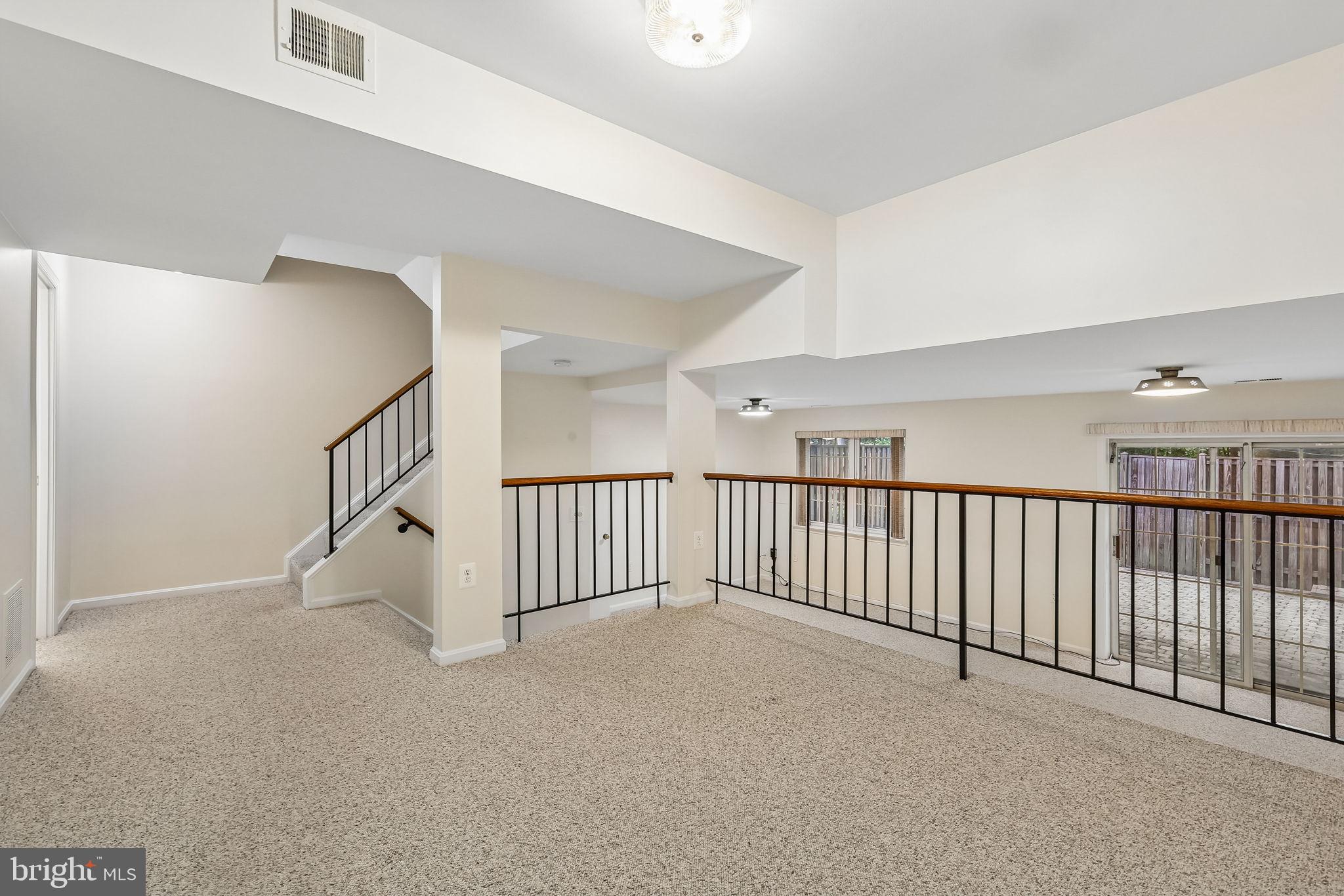 11714 Dry River Court Reston, VA 20191 - Photo 6 of 24 a view of a hallway with windows