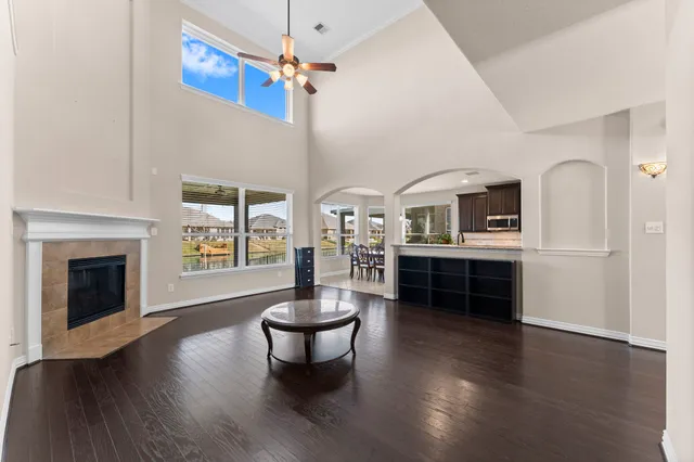 a living room with furniture and fireplace