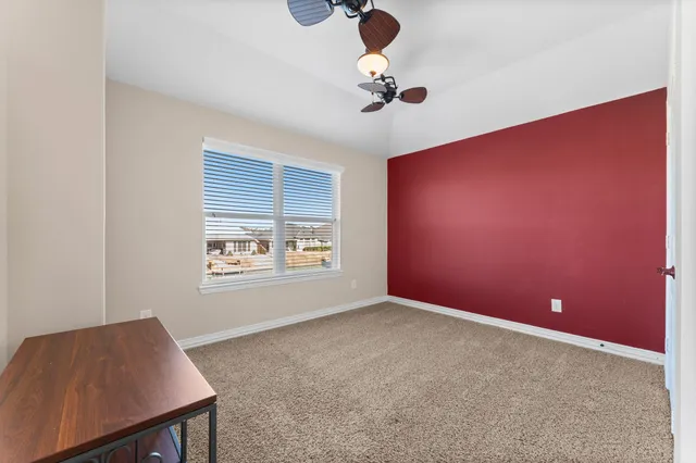 a view of room and a window