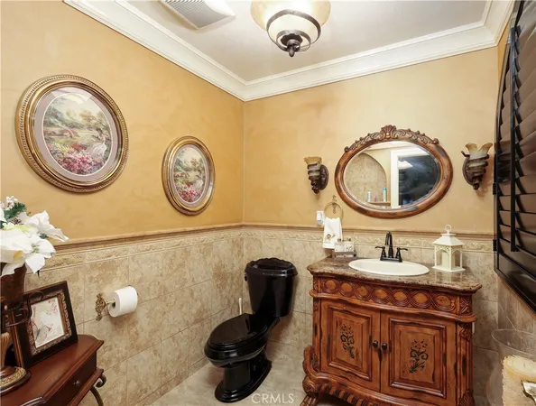 a bathroom with a toilet and a sink