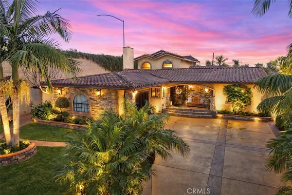 a view of swimming pool with outdoor seating and city view