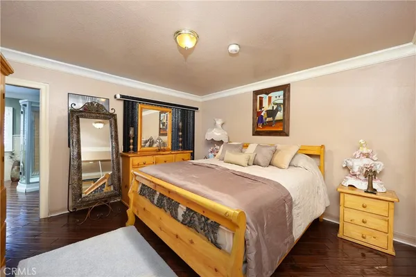 a bed room with a bed and a couch