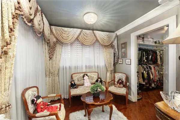 a kitchen with stainless steel appliances kitchen island granite countertop a refrigerator and a stove top oven