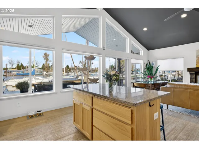 a view of living room and kitchen with furniture