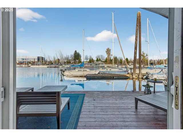 a view of a swimming pool with chairs