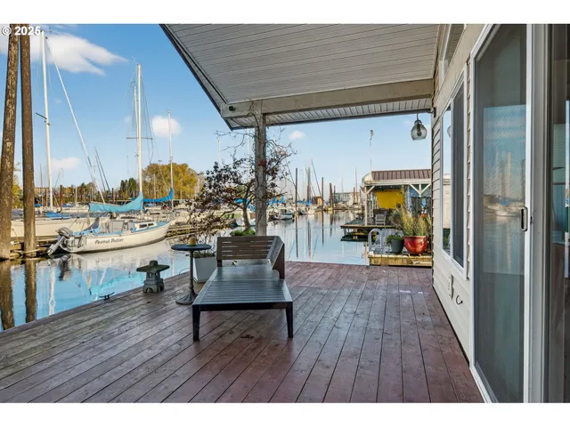a view of a living room and a wooden floor