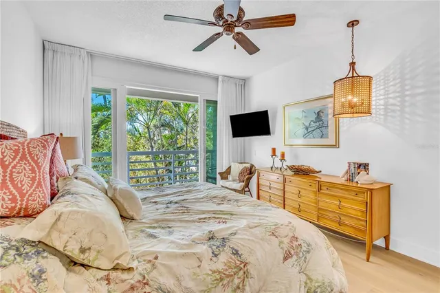 a bedroom with a bed and furniture