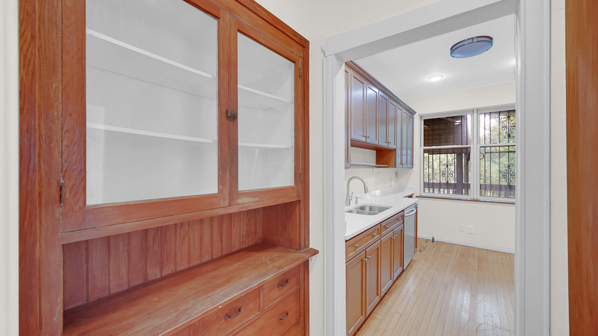 1213 East 53rd Street, Unit 3W Chicago, IL 60615 - Photo 8 of 21 a kitchen with stainless steel appliances granite countertop a stove and a cabinets