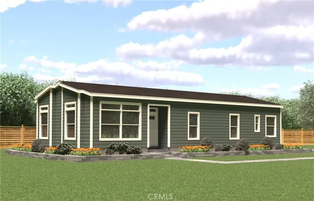 a front view of a house with outdoor seating and garden