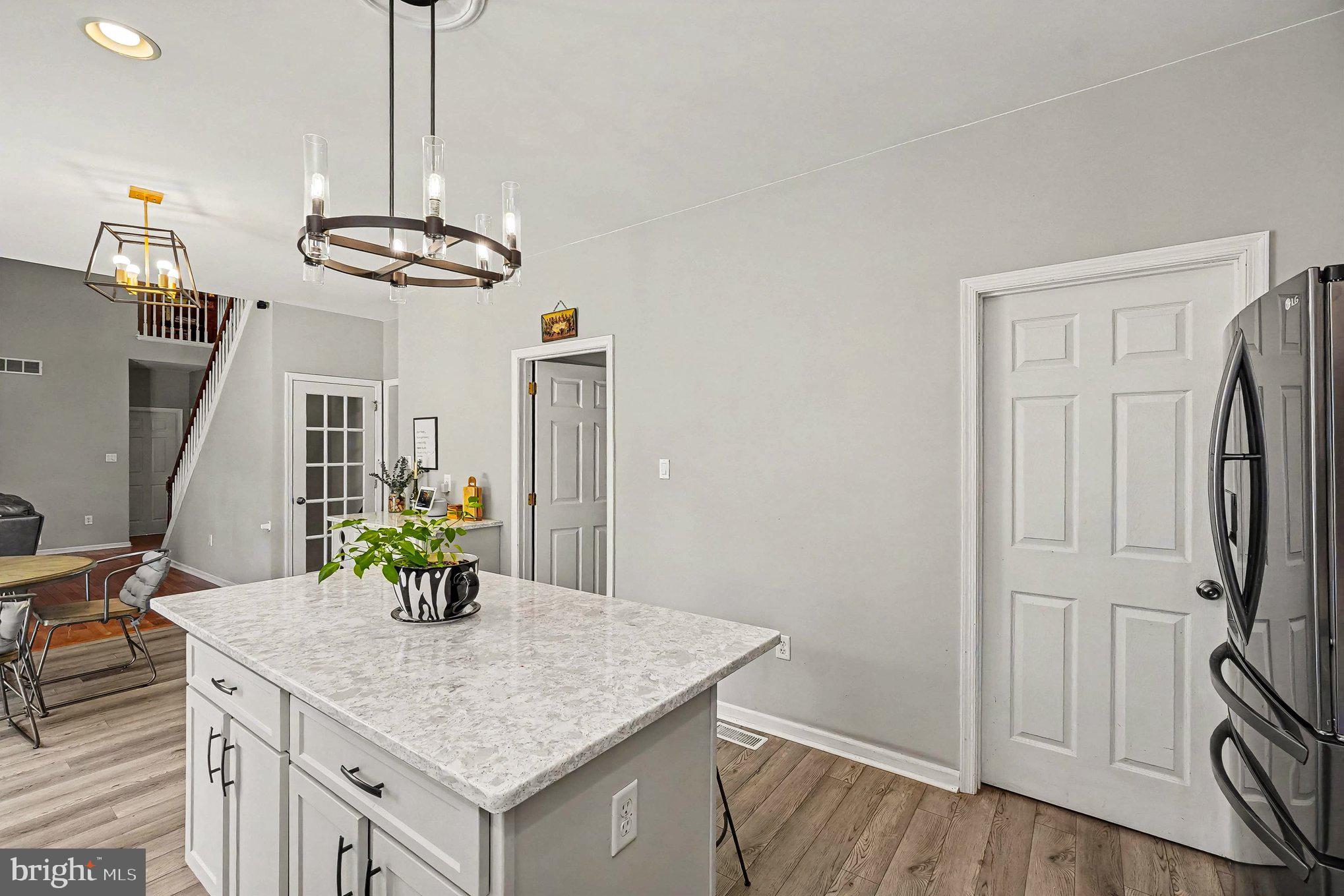 64 Open Meadow Court Elkton, MD 21921 - Photo 22 of 57 a view of dining room and chandelier