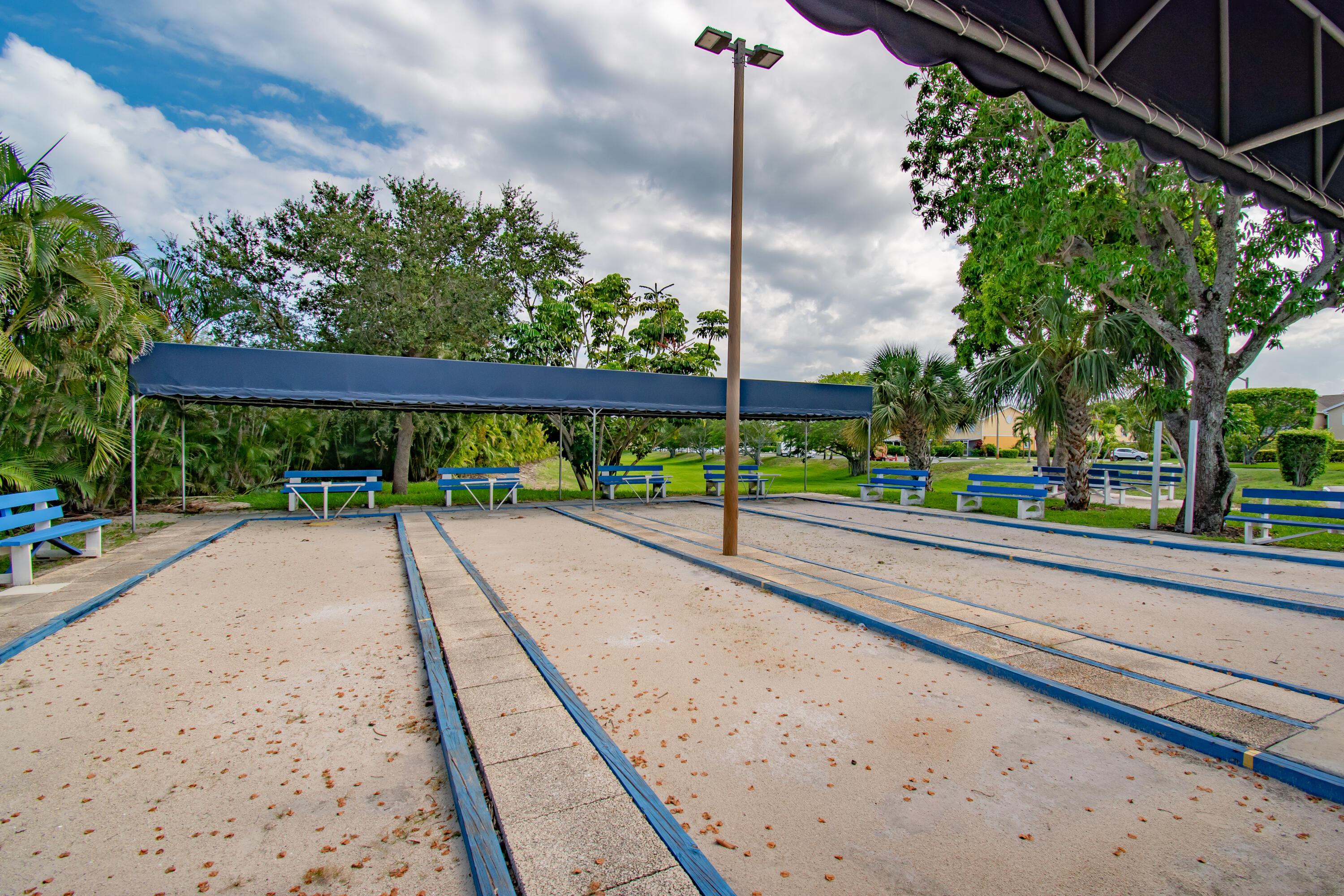 151 Waterside Drive Hypoluxo, FL 33462 - Photo 22 of 30 a view of a street with a park
