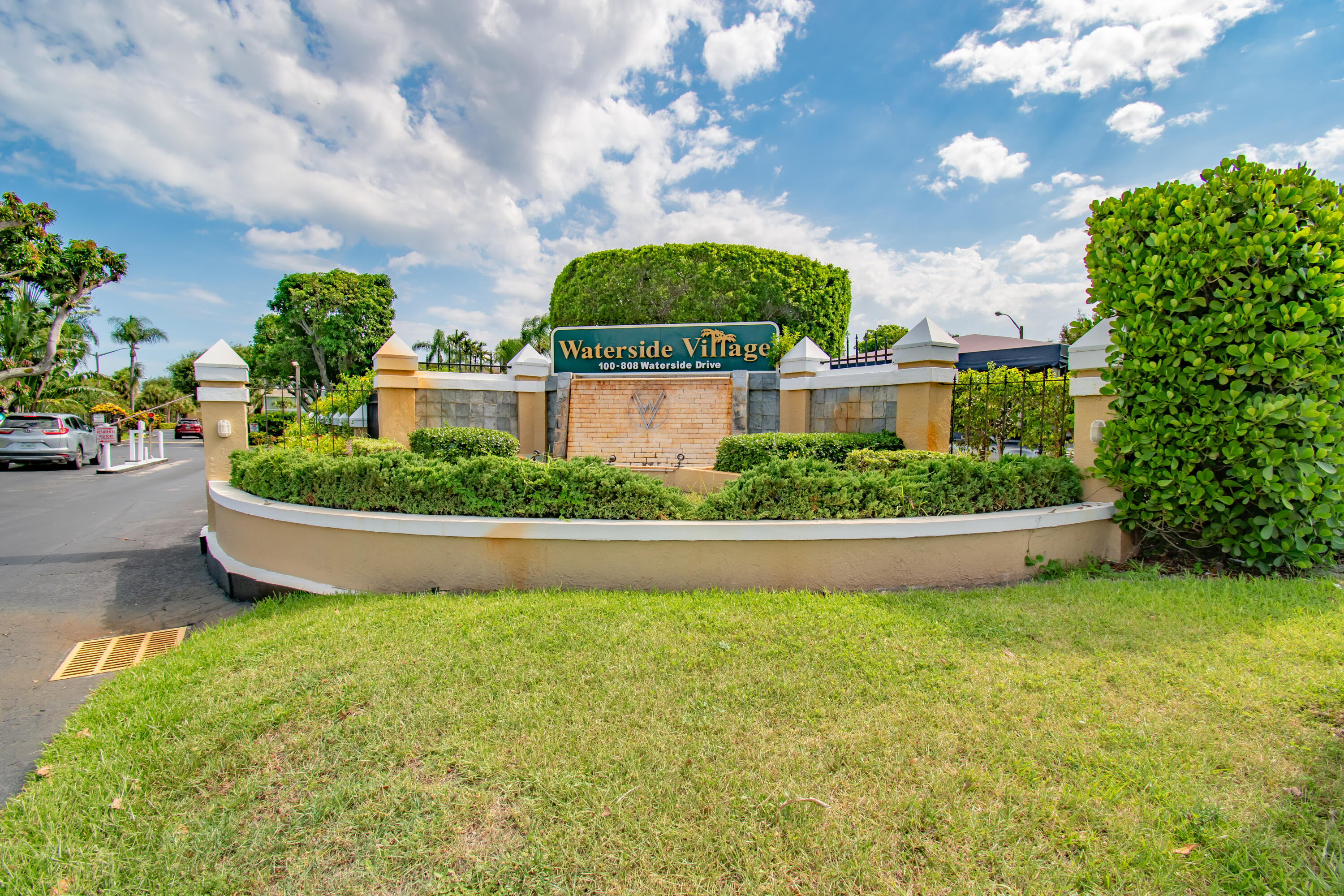 151 Waterside Drive Hypoluxo, FL 33462 - Photo 30 of 30 a view of a garden