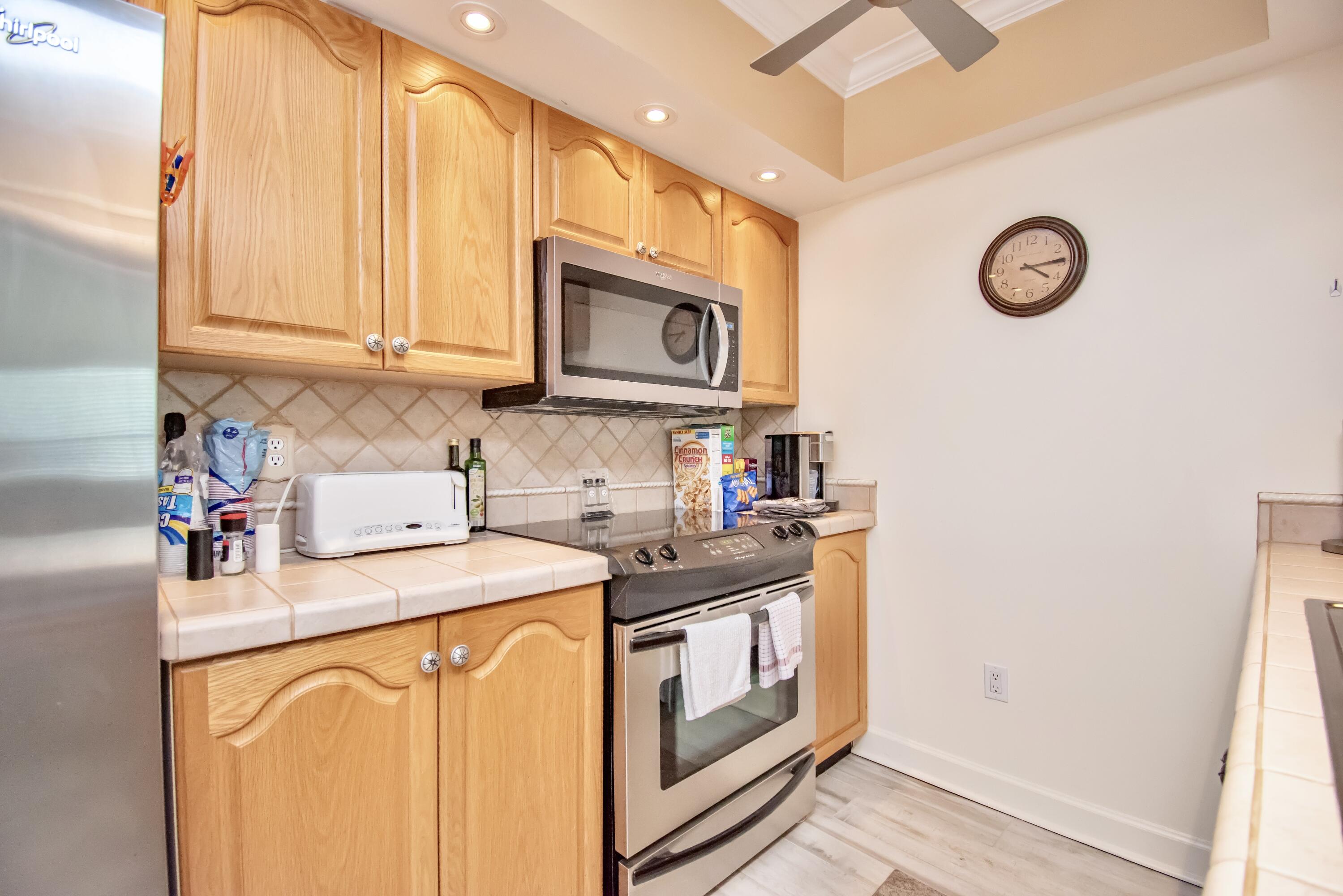 151 Waterside Drive Hypoluxo, FL 33462 - Photo 10 of 30 a utility room with dryer and washer