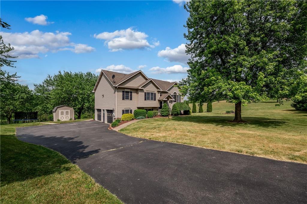 421 Protzman Road Butler, PA 16002 - Photo 2 of 30 a view of a house with a yard and garage