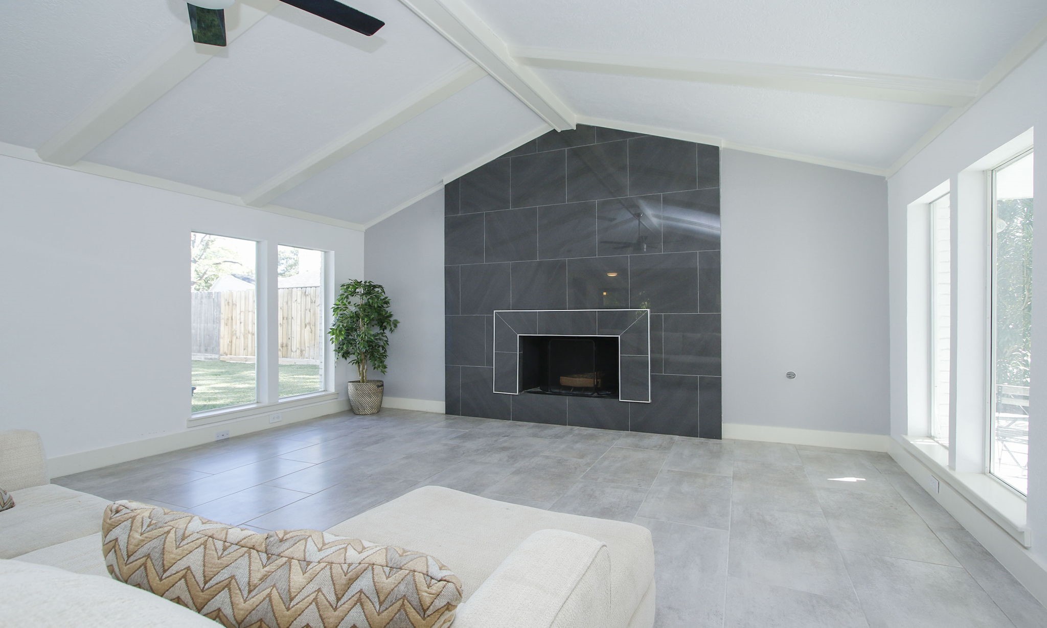 10611 Deerwood Road Houston, TX 77042 - Photo 12 of 47 a living room with furniture and a fireplace