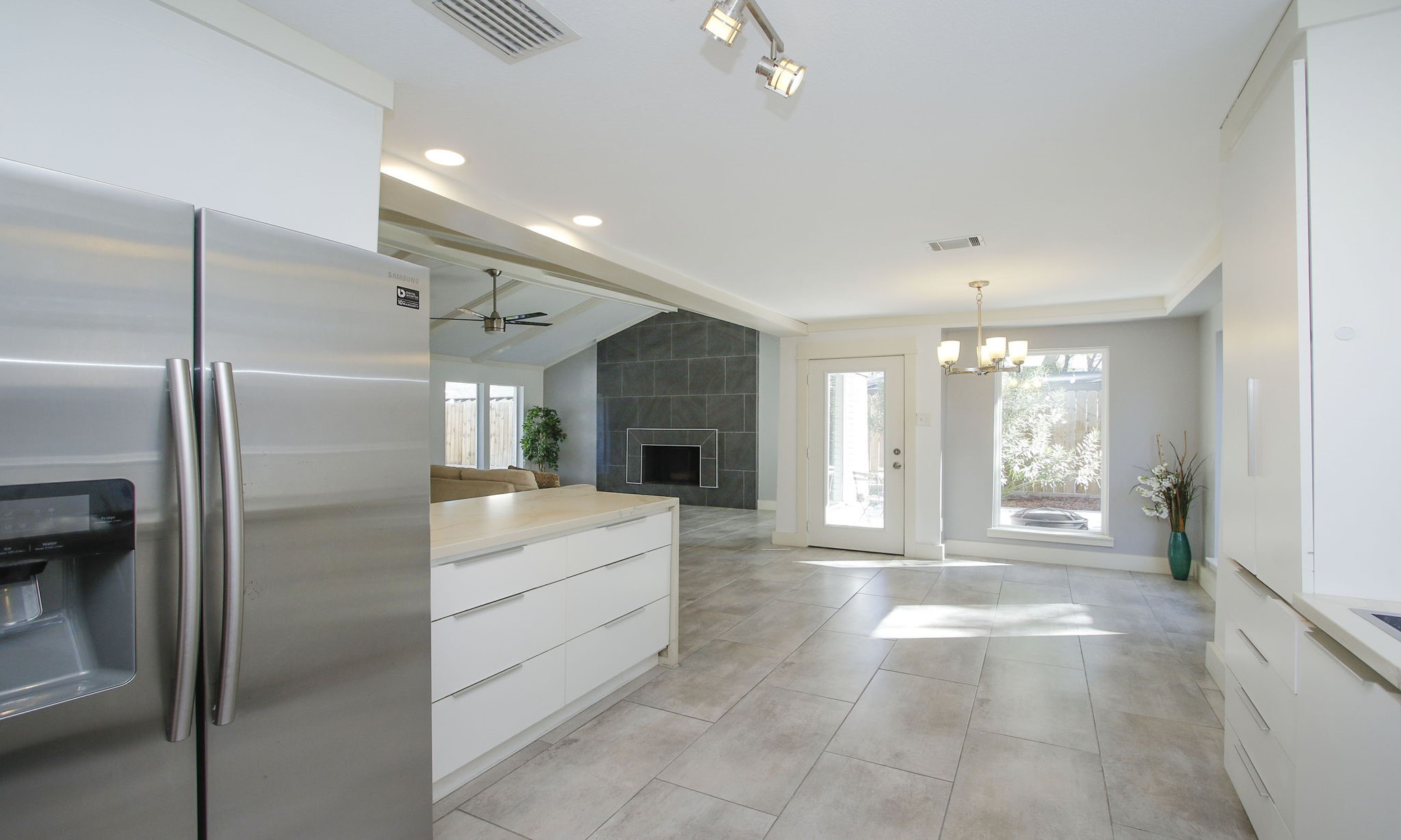 10611 Deerwood Road Houston, TX 77042 - Photo 18 of 47 a bathroom with a tub shower and sink