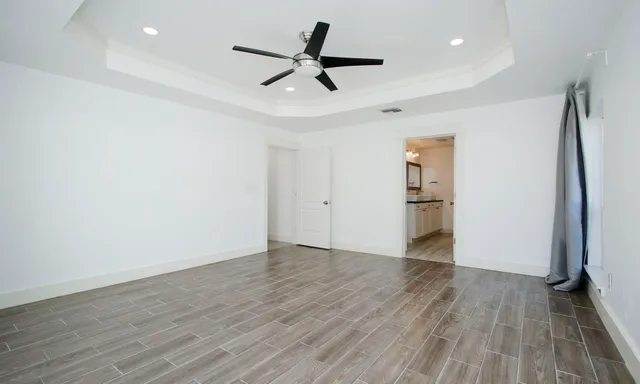 a bathroom with a shower and a tub