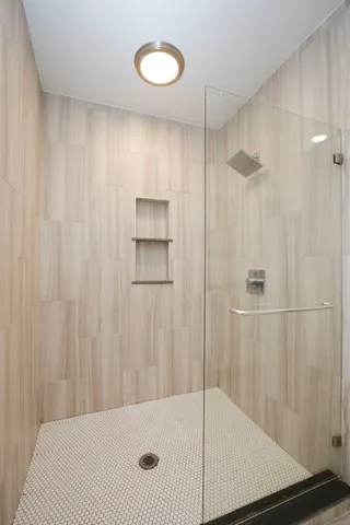 a view of room with wooden floor and chair