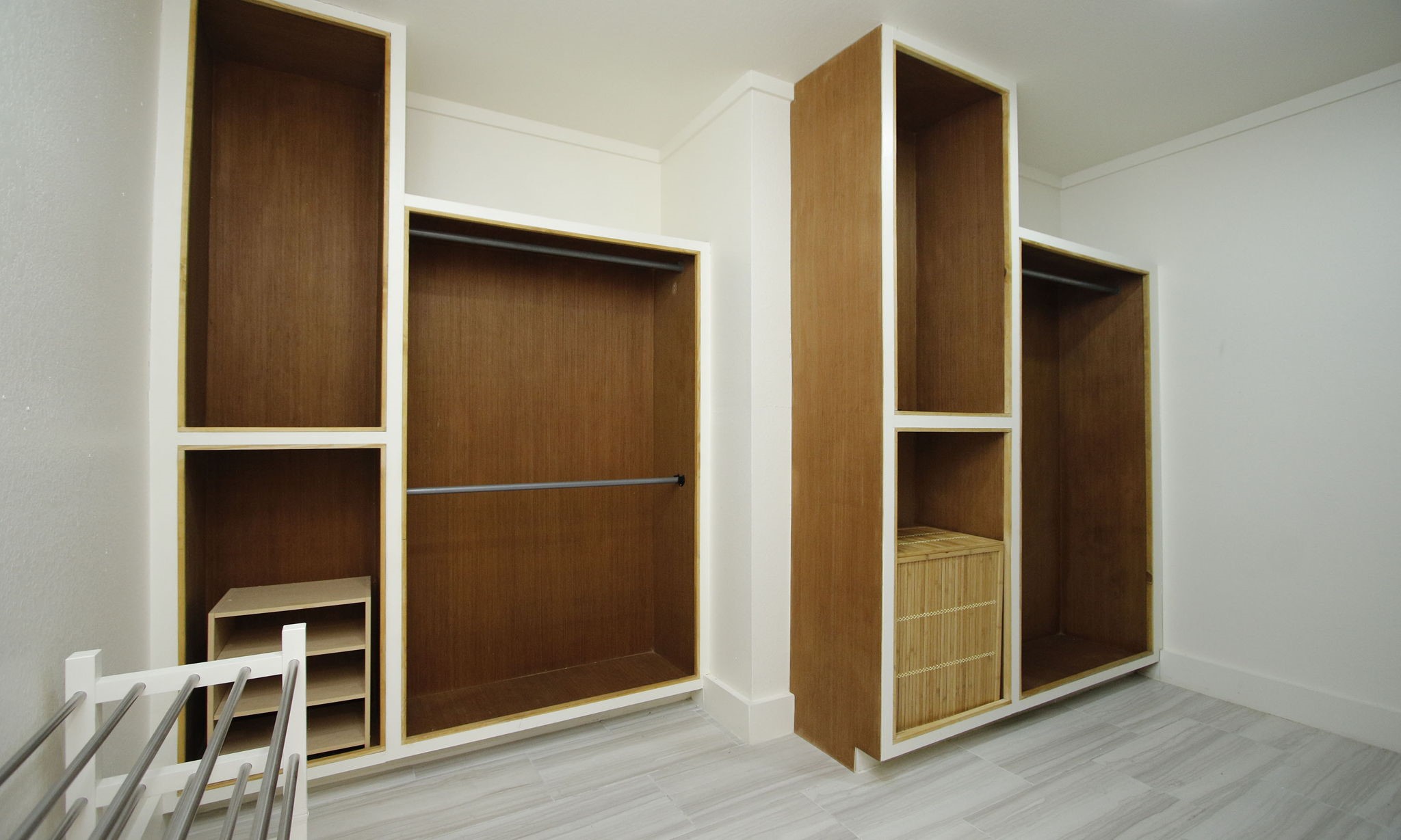 10611 Deerwood Road Houston, TX 77042 - Photo 25 of 47 an empty room with wooden floor and closet