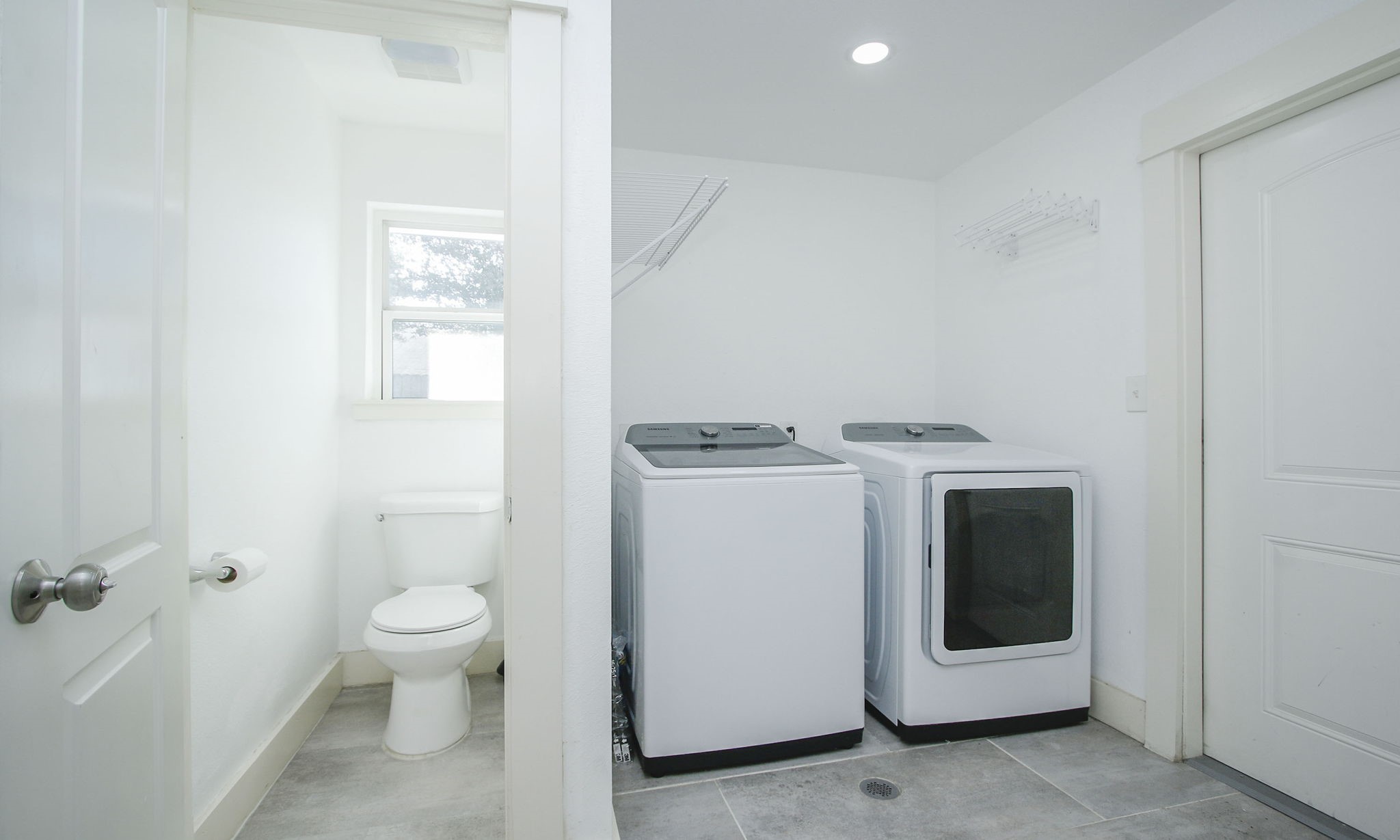 10611 Deerwood Road Houston, TX 77042 - Photo 35 of 47 a utility room with dryer and washer
