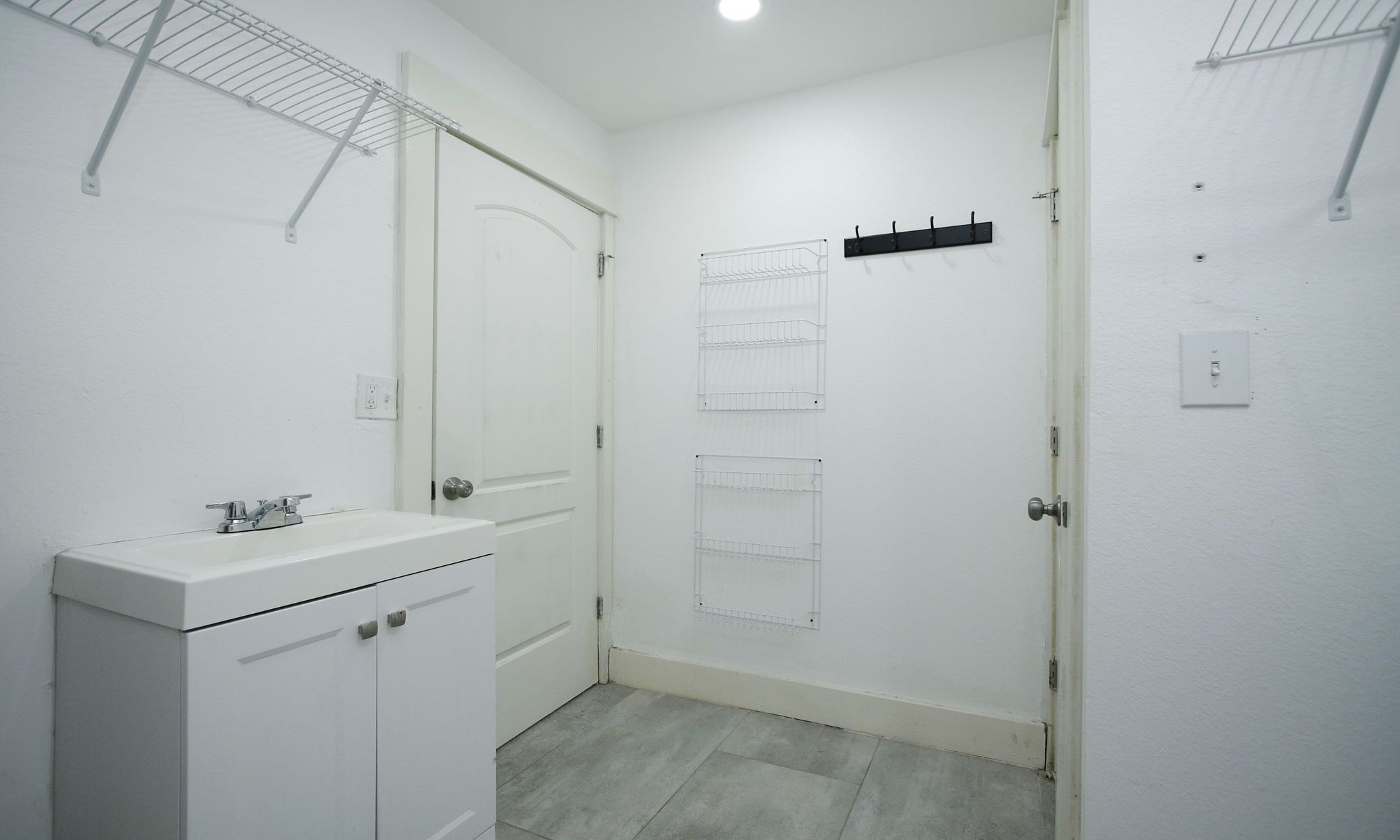 10611 Deerwood Road Houston, TX 77042 - Photo 36 of 47 a bathroom with a sink mirror and shower