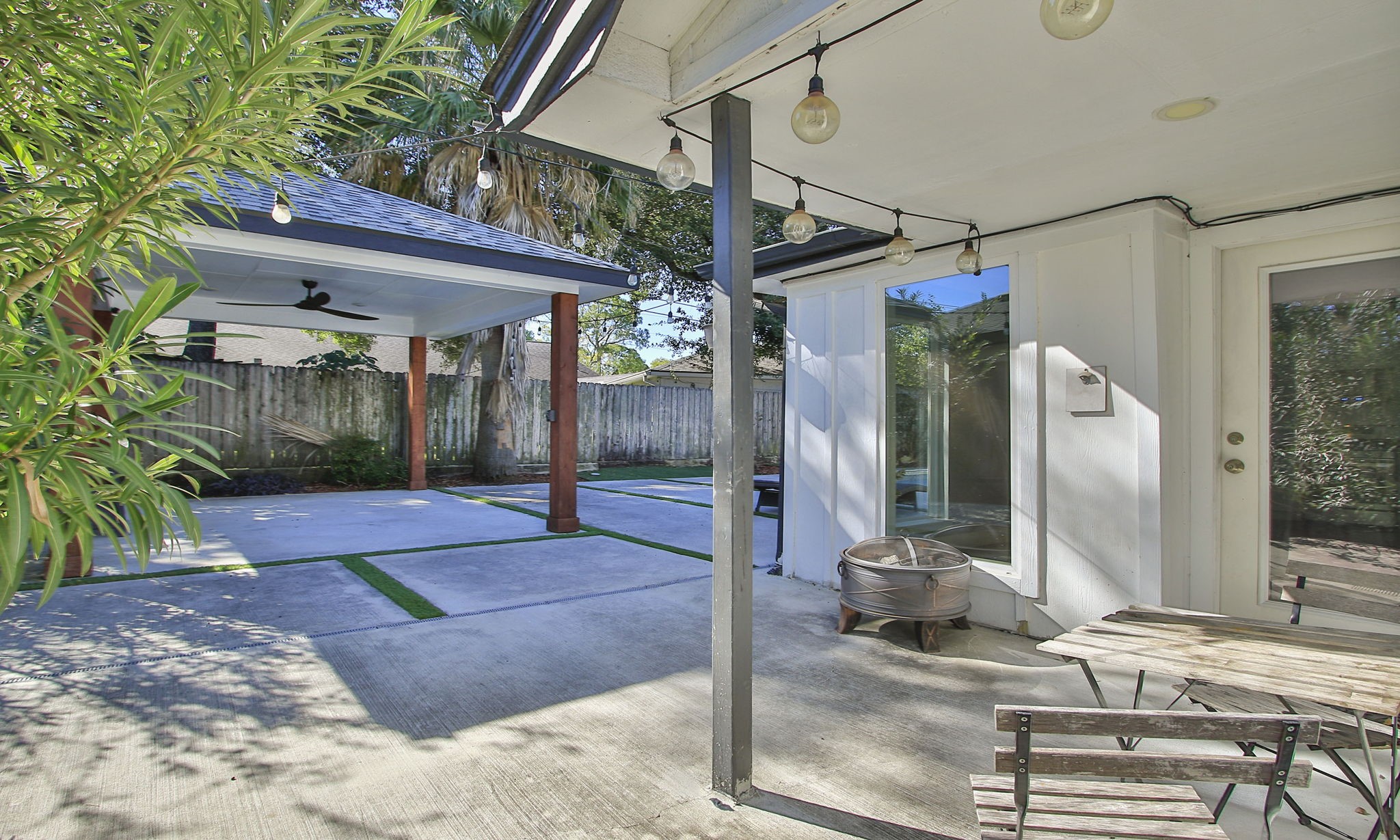10611 Deerwood Road Houston, TX 77042 - Photo 37 of 47 a patio with glass top table and chairs