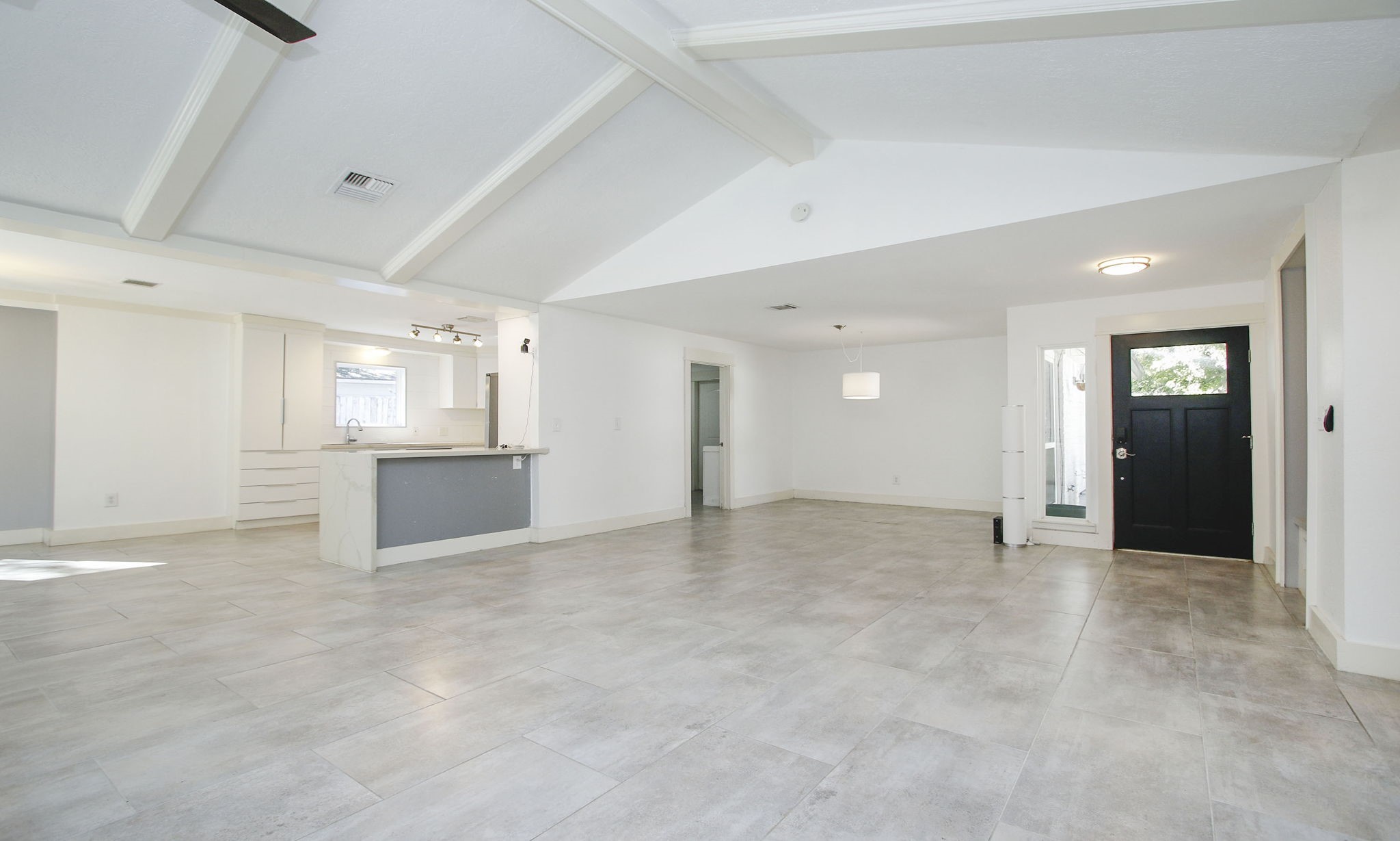 10611 Deerwood Road Houston, TX 77042 - Photo 7 of 47 an empty room with an empty space and windows