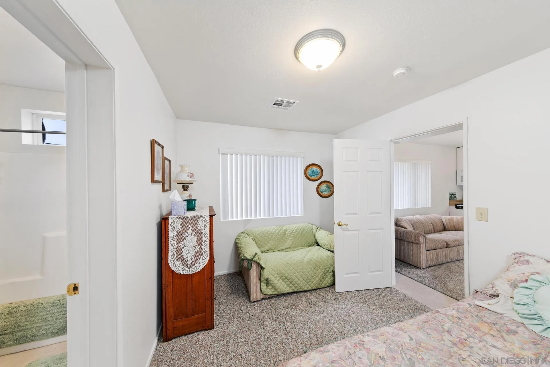 5820 Boulder Creek Road Julian, CA 92036 - Photo 20 of 75 a living room with furniture and a window