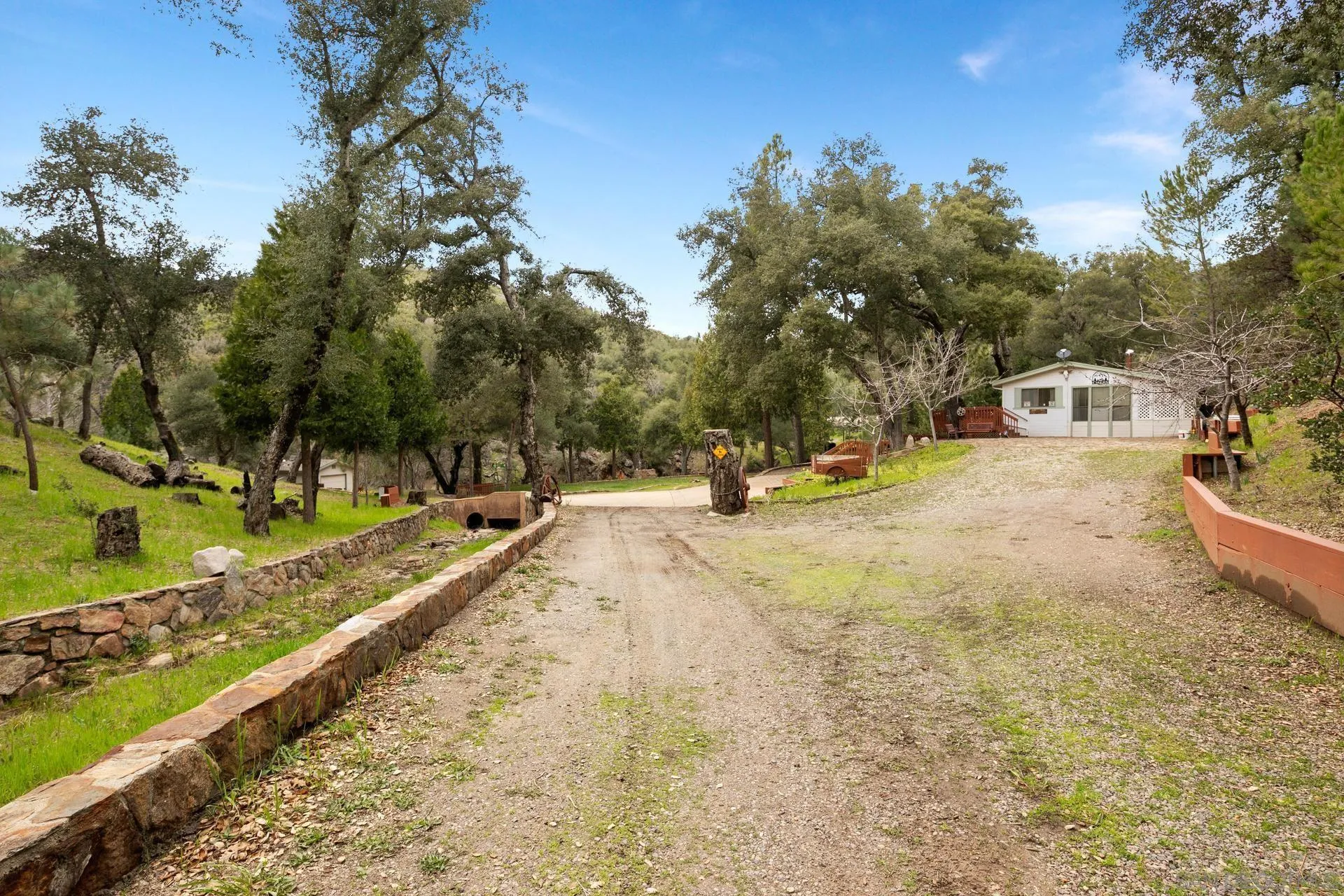 5820 Boulder Creek Road Julian, CA 92036 - Photo 28 of 75 a view of a swimming pool with a patio