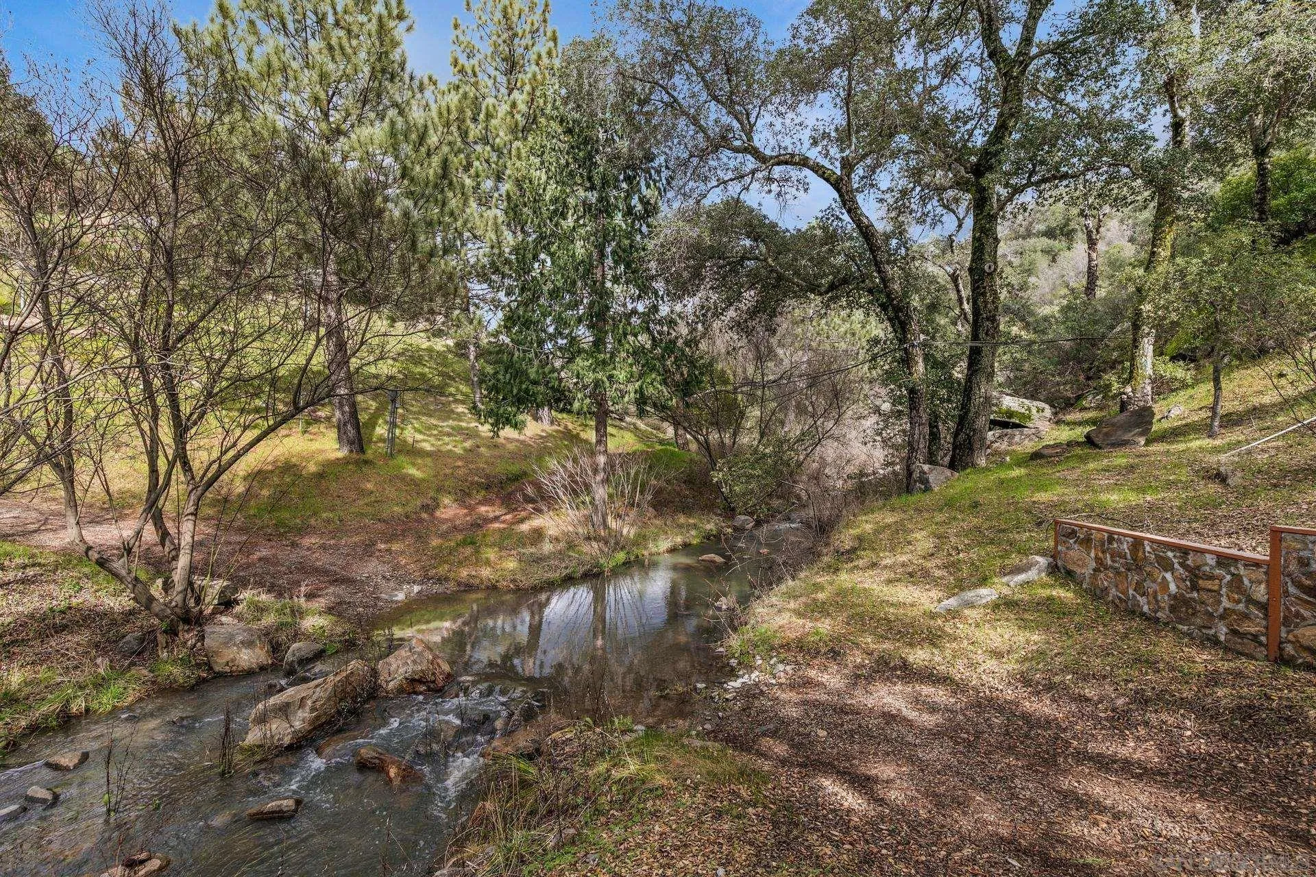 5820 Boulder Creek Road Julian, CA 92036 - Photo 40 of 75 a view of a yard with large trees