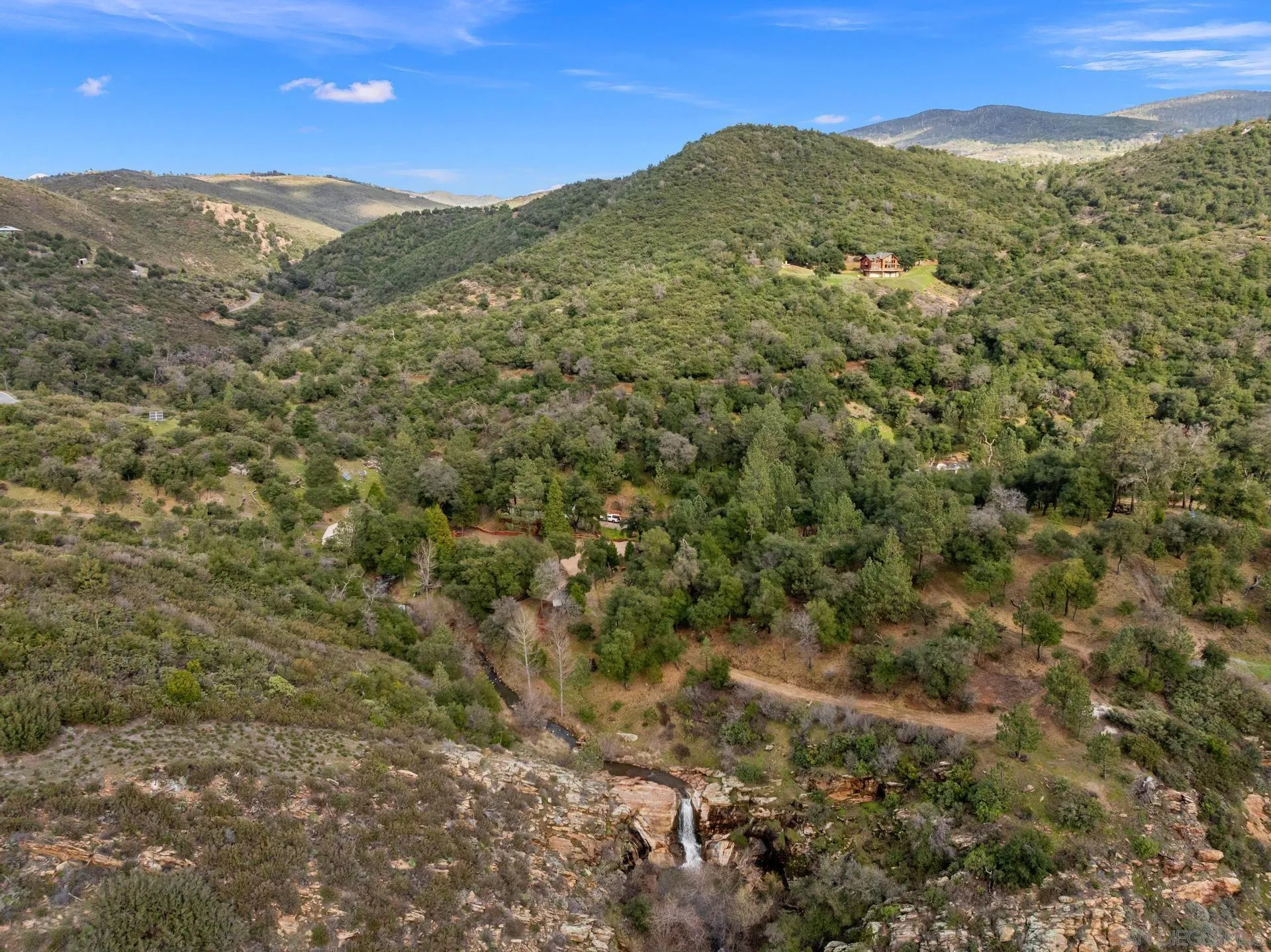 5820 Boulder Creek Road Julian, CA 92036 - Photo 4 of 75 a view of a mountain range with lush green forest