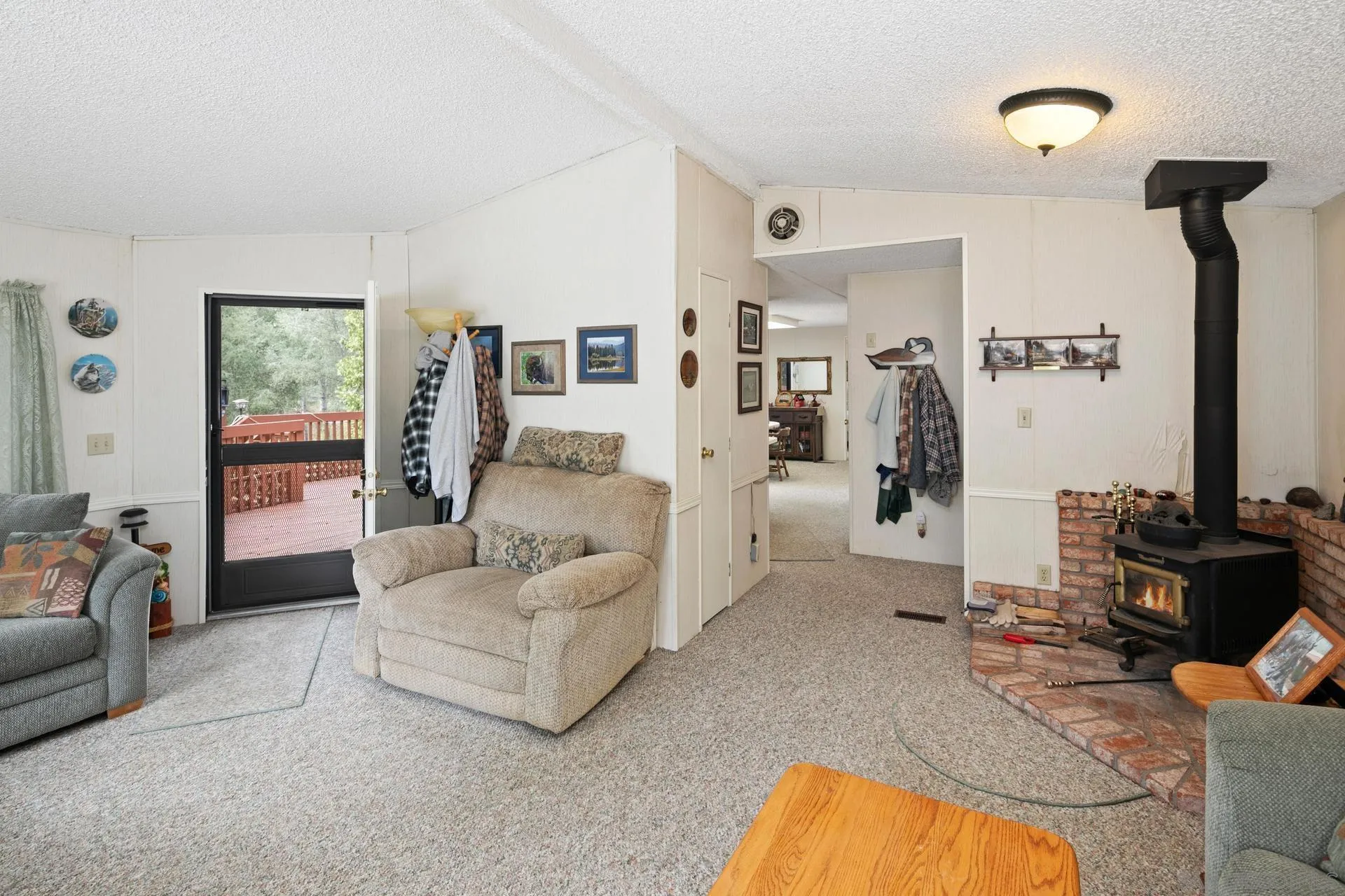 5820 Boulder Creek Road Julian, CA 92036 - Photo 46 of 75 a living room with furniture and a flat screen tv