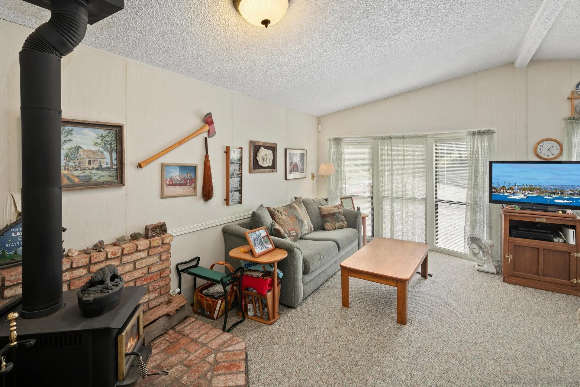 5820 Boulder Creek Road Julian, CA 92036 - Photo 47 of 75 a living room with furniture and a flat screen tv