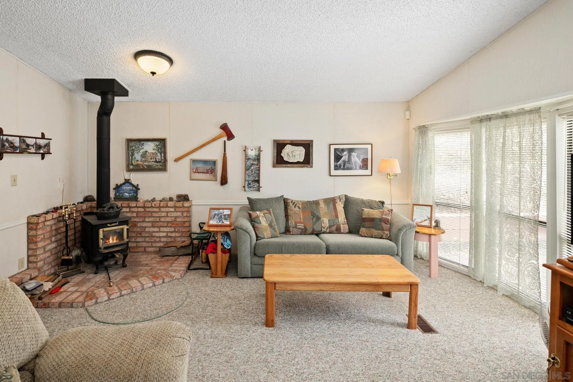 5820 Boulder Creek Road Julian, CA 92036 - Photo 48 of 75 a living room with furniture and a flat screen tv
