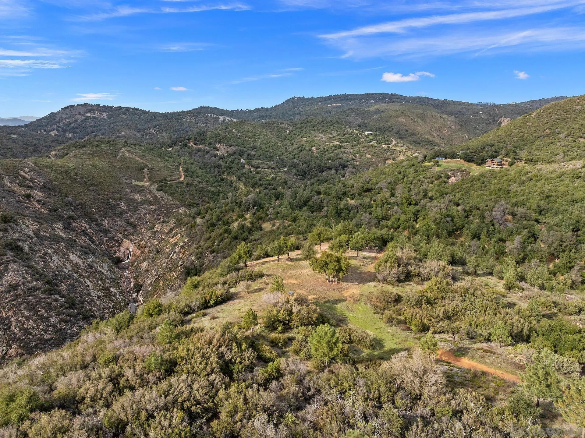 5820 Boulder Creek Road Julian, CA 92036 - Photo 5 of 75 a view of a mountain range with lush green forest