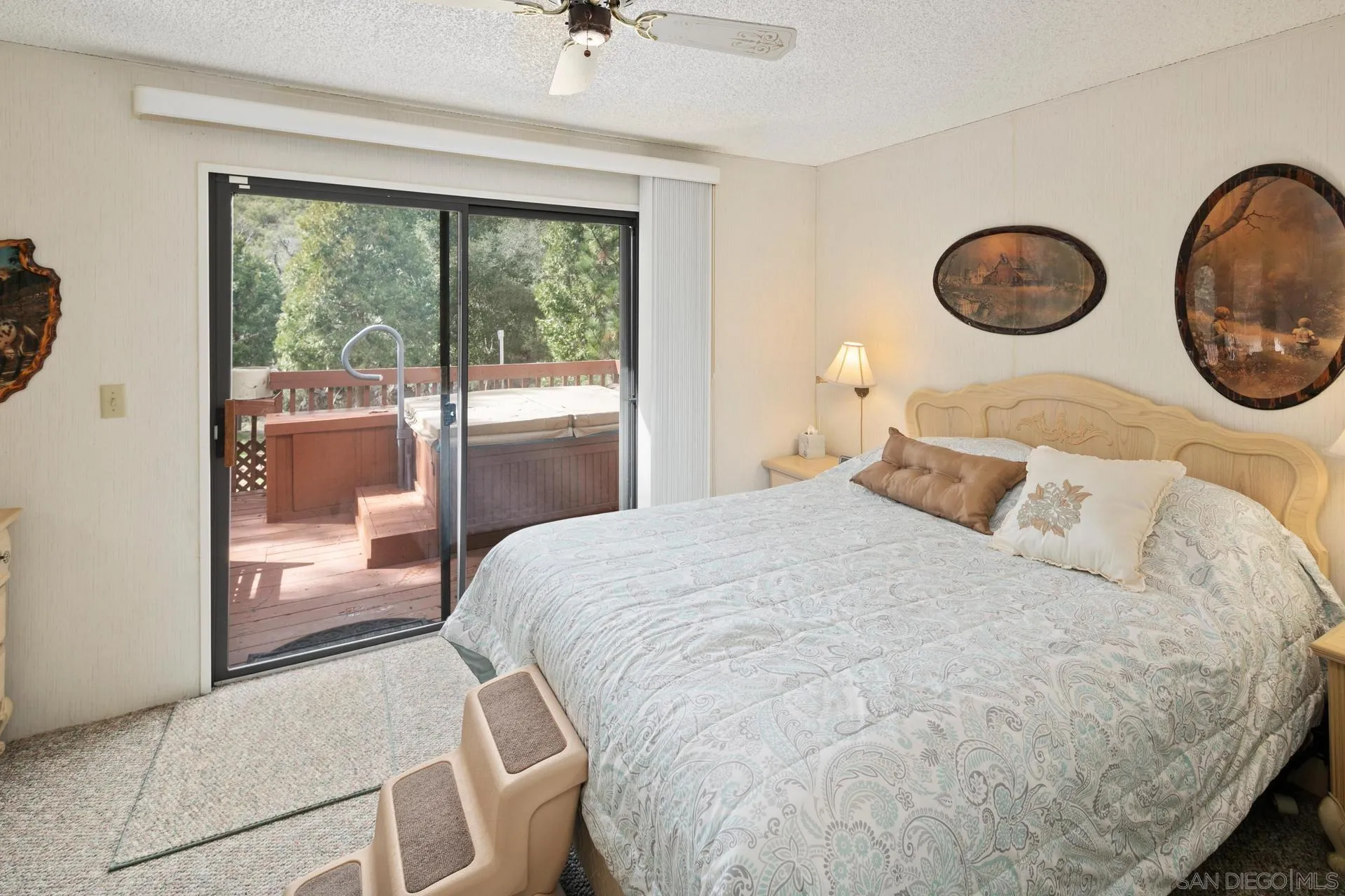 5820 Boulder Creek Road Julian, CA 92036 - Photo 51 of 75 a bedroom with a bed and a large window