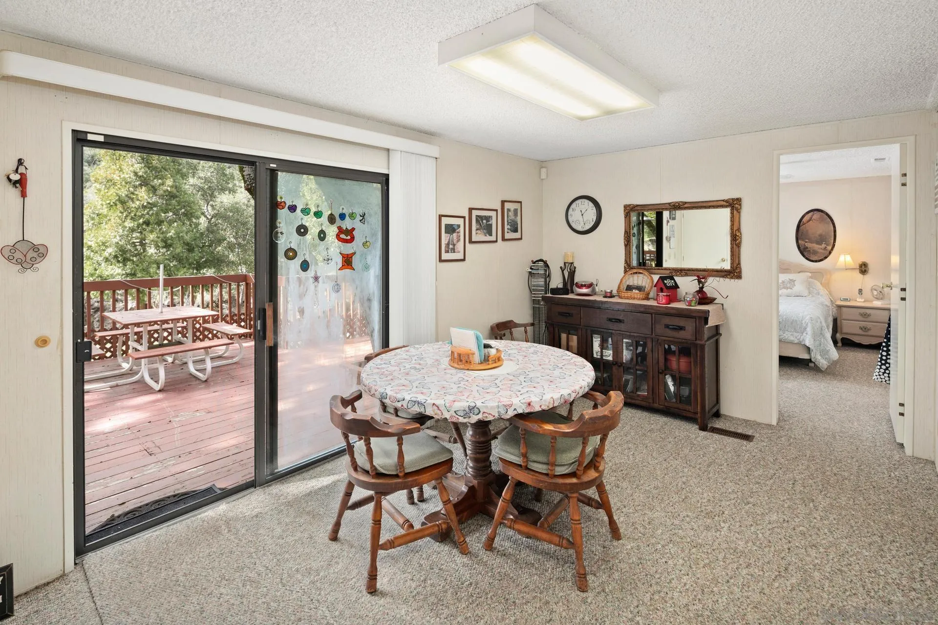 5820 Boulder Creek Road Julian, CA 92036 - Photo 59 of 75 a view of a dining room with furniture window and outside view