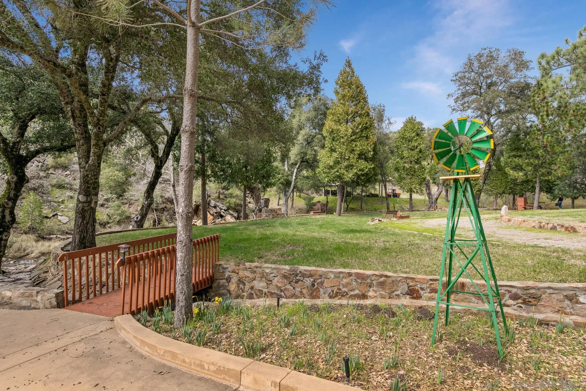 5820 Boulder Creek Road Julian, CA 92036 - Photo 73 of 75 a view of a garden with a tree