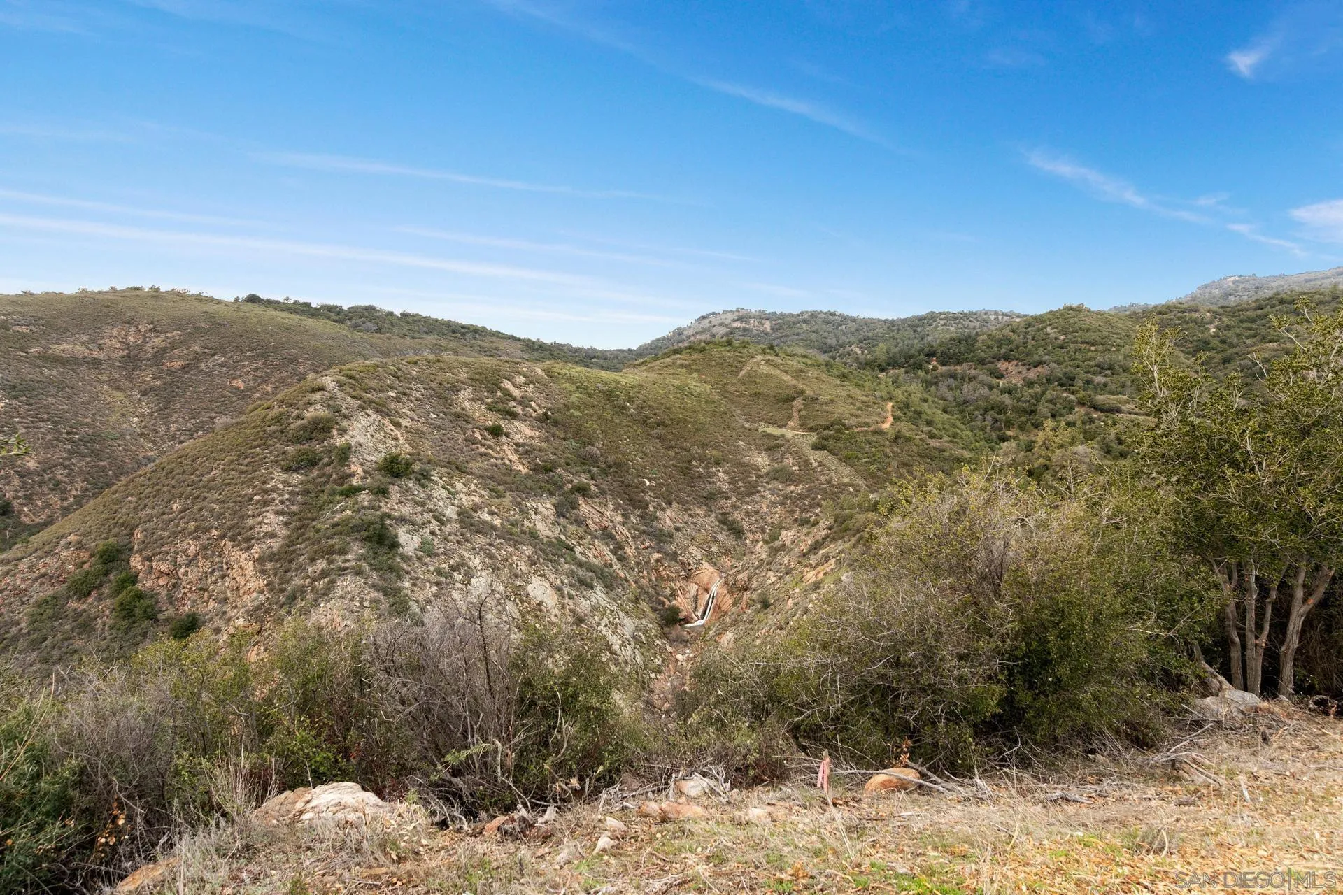 5820 Boulder Creek Road Julian, CA 92036 - Photo 74 of 75 a view of a yard with a mountain in the background